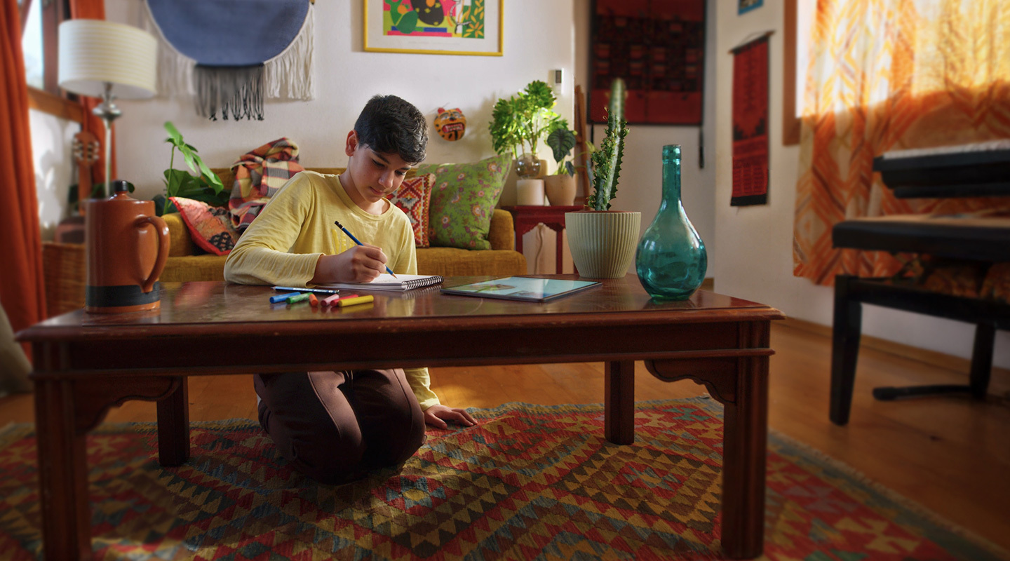 A guy drawing with tablet