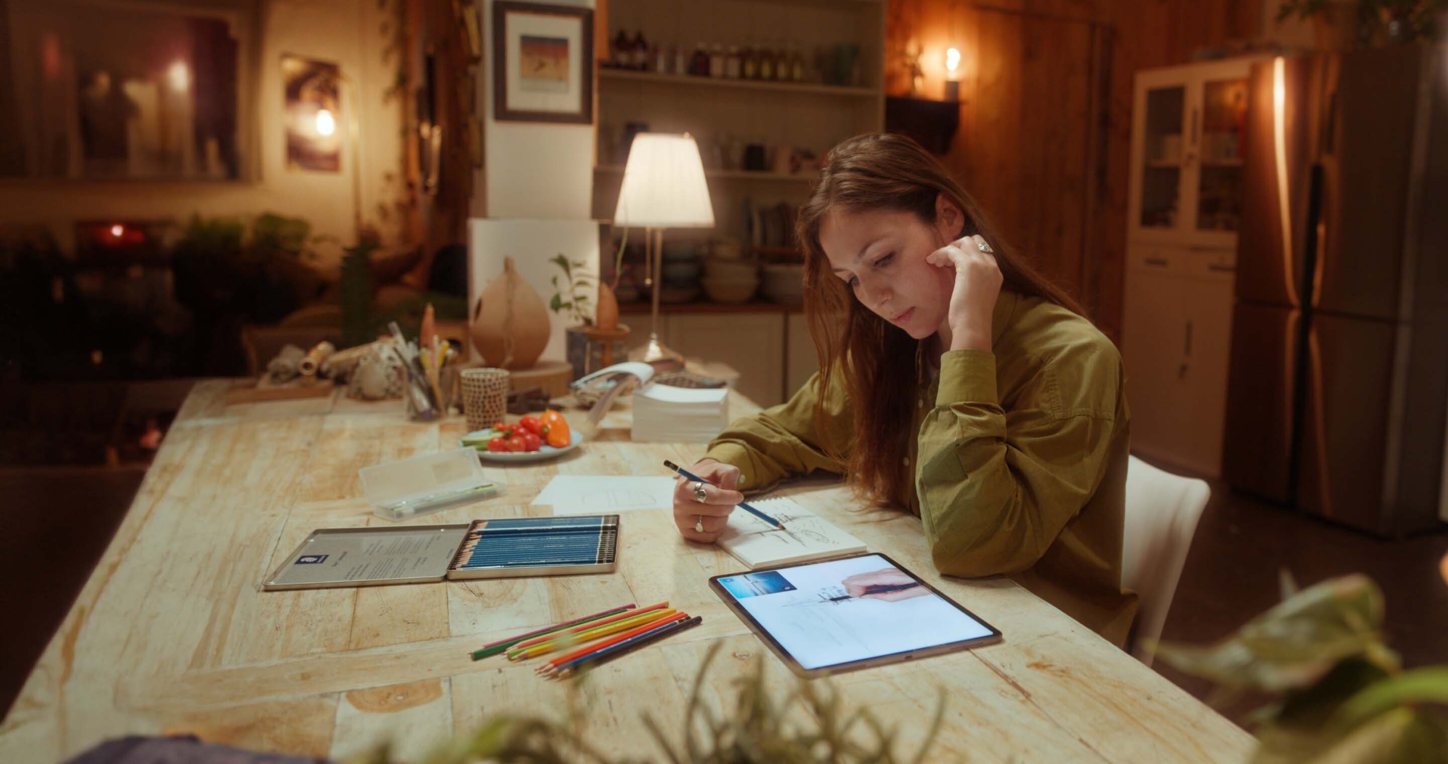 A guy drawing with tablet